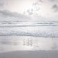 Tranquil beach with cloudscapes